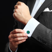 Man in pinstripe suit wearing raw azurite-malachite cufflinks at white French cuff — Jan Leslie