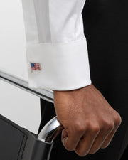 Enamel American flag cufflinks on white dress shirt cuff by Jan Leslie.
