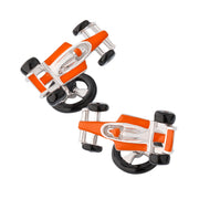 Pair of sterling silver three-dimensional Formula 1 racing car cufflinks with bright orange enamel body panels, black enamel tires, polished silver open cockpit chassis, and black enamel steering wheel toggle bar closure, Jan Leslie