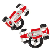 Pair of sterling silver three-dimensional Formula 1 racing car cufflinks with red enamel body panels, black enamel tires, polished silver chassis detail, and silver toggle bar closure, Jan Leslie