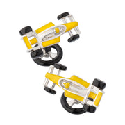 Angled overhead pair of sterling silver three-dimensional Formula 1 racing car cufflinks with bright yellow enamel body panels, black enamel tires, polished silver open cockpit and nose cone detail, and black enamel steering wheel toggle bar closure, Jan Leslie