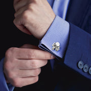 Sterling silver octopus cufflinks styled on blue striped dress shirt with navy suit, Jan Leslie