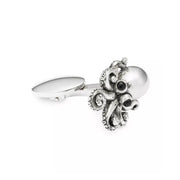 Side profile of sterling silver octopus cufflink with pearl-dome head and curled tentacle detail, Jan Leslie