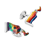 Sterling silver paint tube cufflinks pair angled view showing multicolor swirl and rainbow stripe resin faces and whale-back closure detail by Jan Leslie