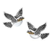 Sterling silver and 18K gold dove of peace cufflinks pair front view showing full wing span oxidized feather engraving pearl body and gold olive branch detail by Jan Leslie