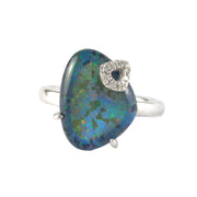 Sterling silver freeform black opal ring with diamond pavé spiral accent.