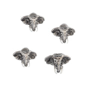 Sterling silver elephant head tuxedo stud set with gray and white enamel detail and ivory tusk accents.