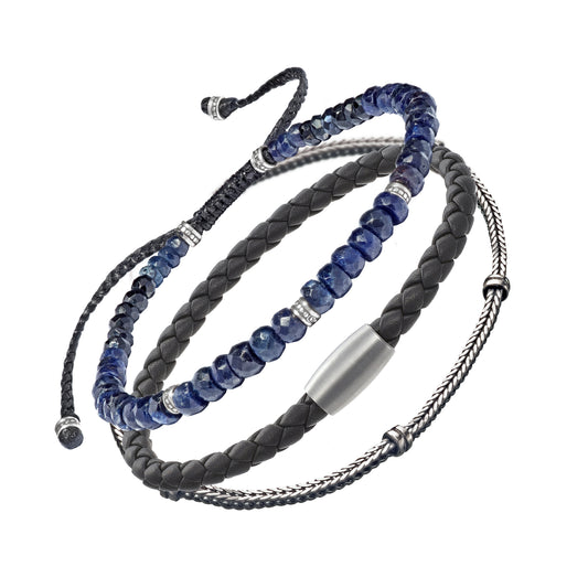 an Leslie men's blue and grey bracelet stack showing blue faceted sodalite rondelle bead bracelet with silver spacers grey braided leather bracelet with magnetic clasp and sterling silver foxtail chain bracelet layered together by Jan Leslie