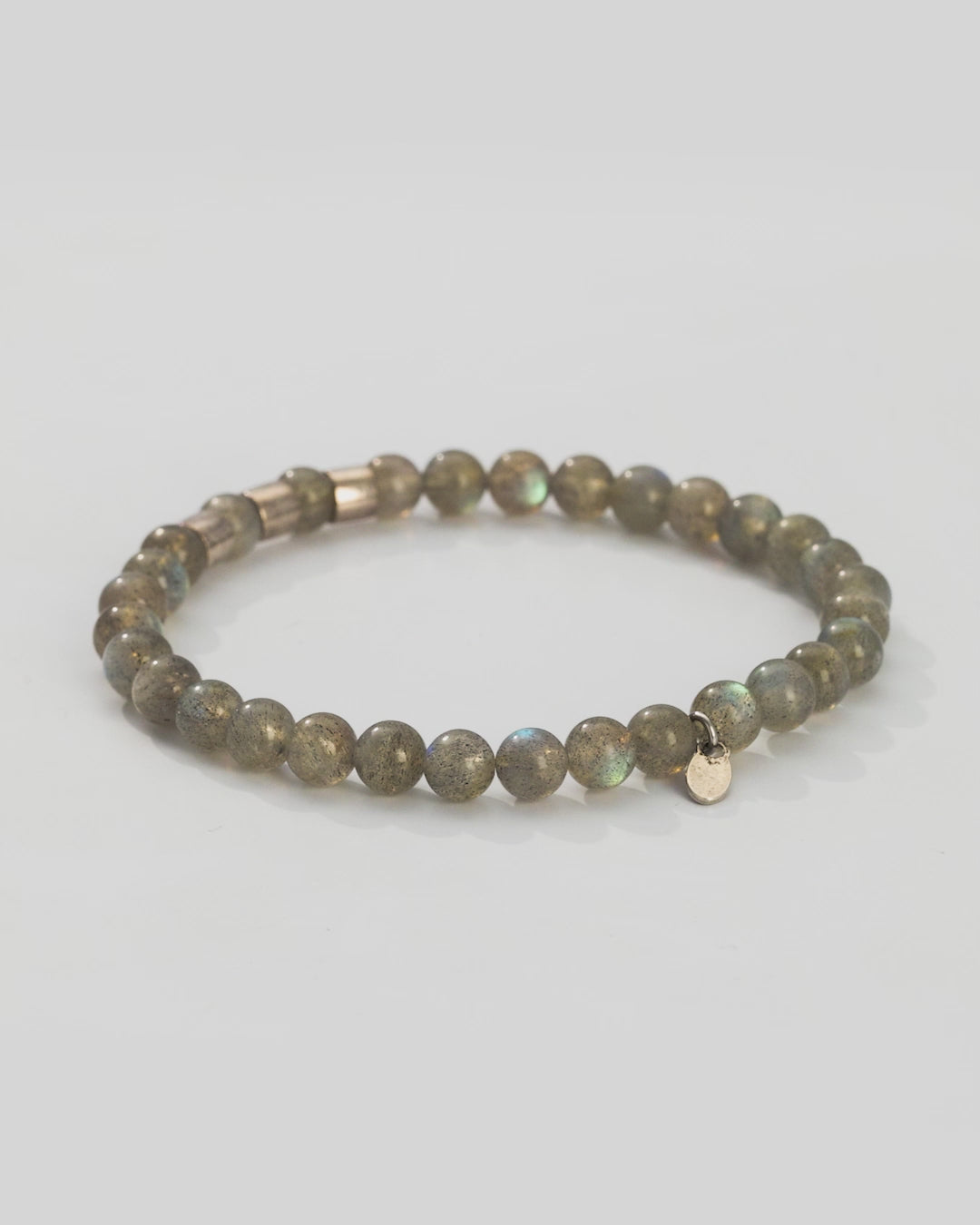 360 degree video of the Gemstone Beads and Sterling Silver Spacer Elastic Bracelet in labradorite. 