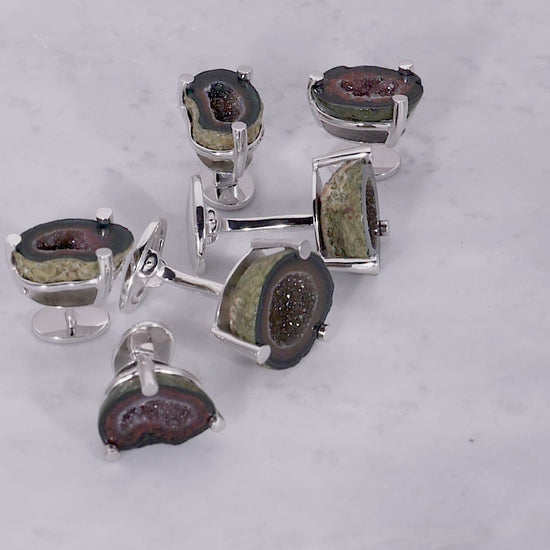 180 degree video of the Druzy Crystallized Gemstone Sterling Silver Cufflinks and Tuxedo Studs on marble background. 