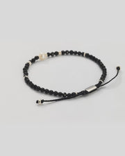 360 video of the Men's Black Onyx Beaded Bracelet with Freshwater Pearl Center. Video shows the full bracelet and close up of the freshwater pearl center and sterling silver spacers. 