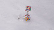 180 video of the Moving Puzzle Cube Multi Color Enamel & Sterling Silver Cufflinks on a marble background. 
