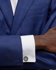 Round mother of pearl cufflink with engraved screw-head rivet border