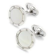 Round mother of pearl cufflink with engraved screw-head rivet border