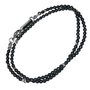 Top view of Dark Grey Pyrite Bead Wrap Bracelet on white background. 