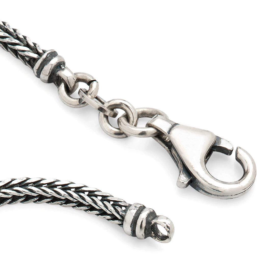 Close up of lobster claw and 925 sterling silver herringbone detail. 