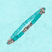 Jan Leslie turquoise rondelle bracelet with oxidized sterling silver disc spacers and turquoise cabochon end cap 