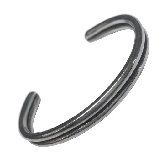Oxidized sterling silver double-rail open cuff bracelet with a sleek, minimalist profile and adjustable open ends