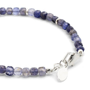 Close up of the sterling silver lobster claw closure on the Faceted Rutilated Quartz Gemstone Beaded Bracelet with Sterling Silver Skull. 