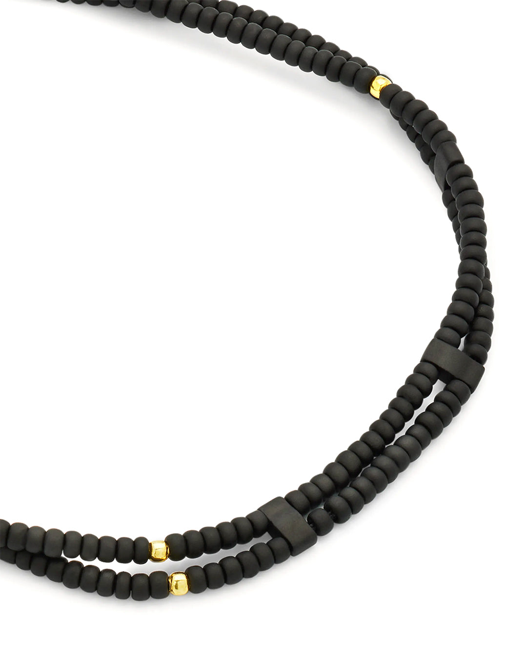 Close up of  black and sterling silver vermeil micro beads on the Double Strand Black Micro Bead Wax Pull Cord Sterling Silver Bracelet. 