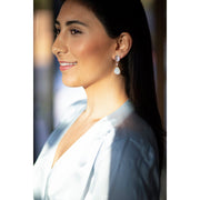 Jan Leslie 'Heaven' drop earrings in 18k gold with luminous white stone drop