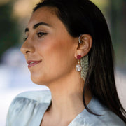 Rough ruby trillion and oval moonstone diamond drop earrings in 18k gold vermeil on model