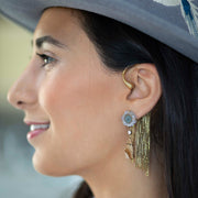 One-of-a-kind solar quartz druzy stud with gold chain tassel and 18K gold ear cuff worn on model