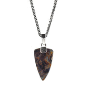 Close up of the Pietersite gemstone on the Pietersite One-of-a-Kind Arrow Pendant Sterling Silver Necklace. 