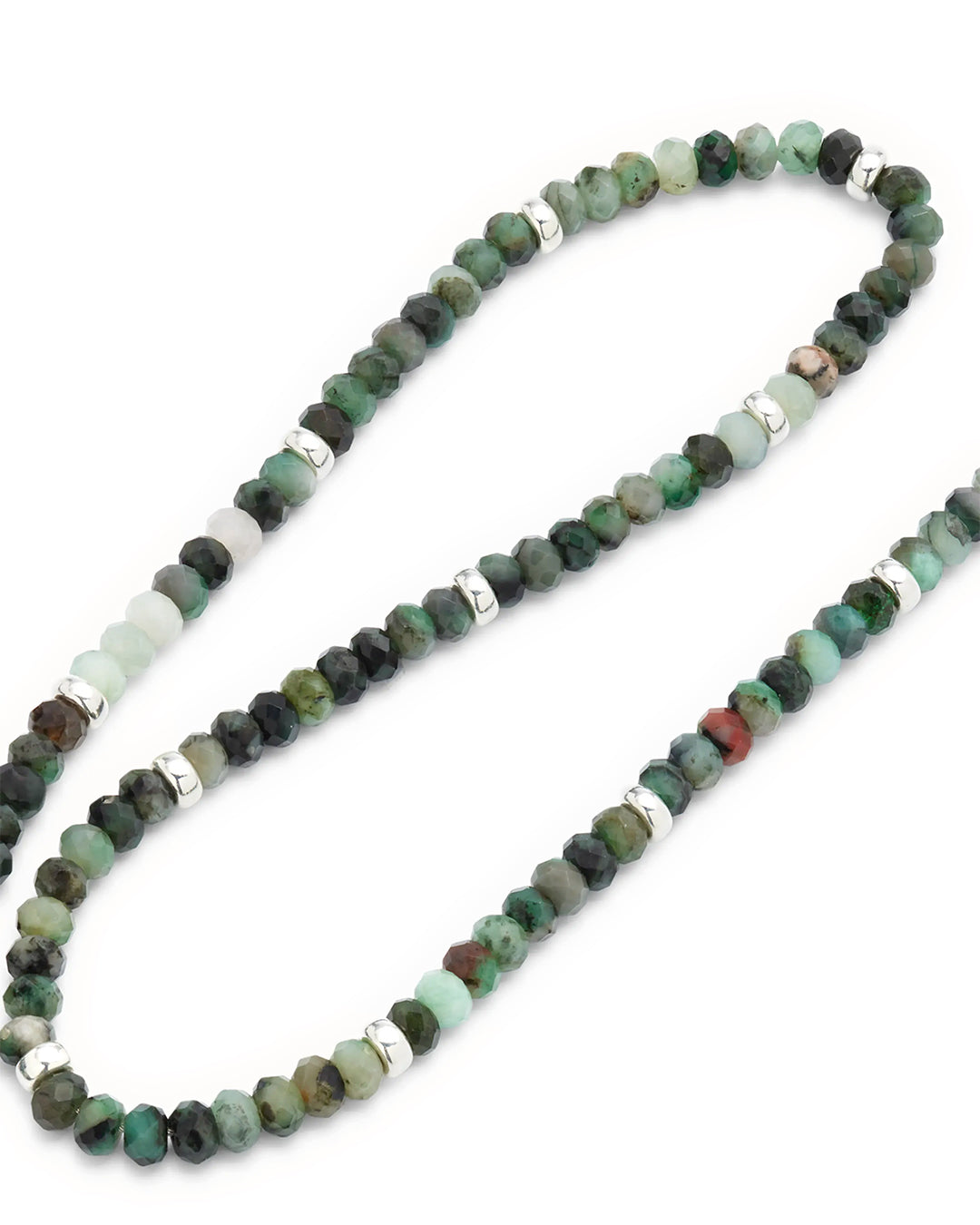 Close up of faceted emerald beads and sterling silver accents on the Emerald Beaded Necklace with Sterling Silver Accents and Toggle Closure. 