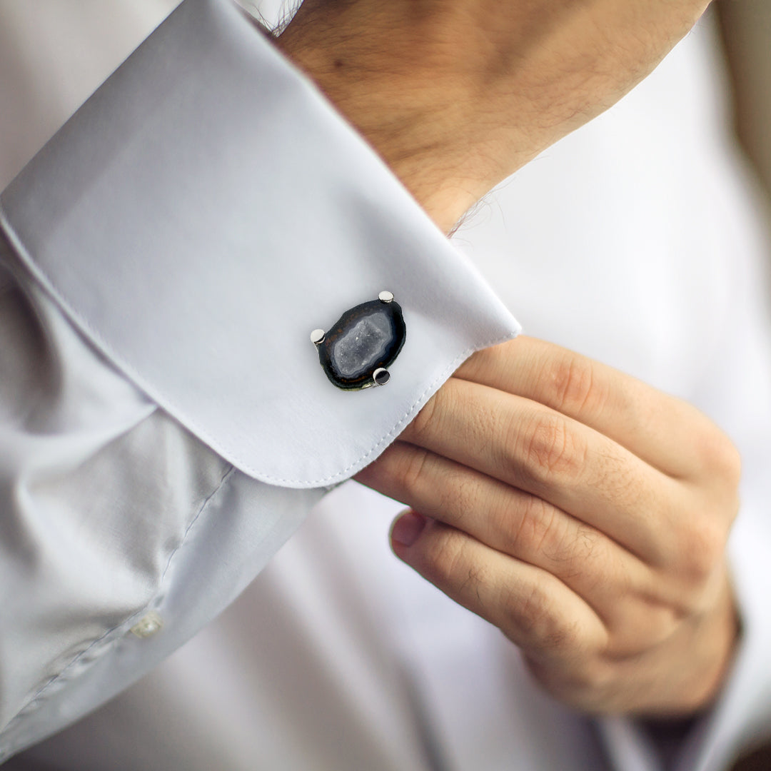 Close up of male models wrist wearing the Grey Druzy Crystallized Gemstone Sterling Silver Cufflinks in Grey on a white cuffed shirt. 