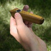 Jan Leslie's Tiger's Eye 'Power Stone' gemstone pipe, carved into a faceted crystal obelisk
