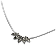Marcasite pavé three-leaf cluster sterling silver necklace showing pendant detail on snake chain