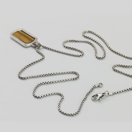 360 degree video of the Tiger's Eye Gemstone Plaque Sterling Silver Pendant Necklace with full and close up views. 