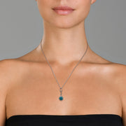 Model wearing the Evil Eye Gemstone Cabochon Sterling Silver Pendant in turquoise. 